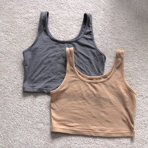 Set of two cropped tank tops. Size extra small. One gray and one tan.